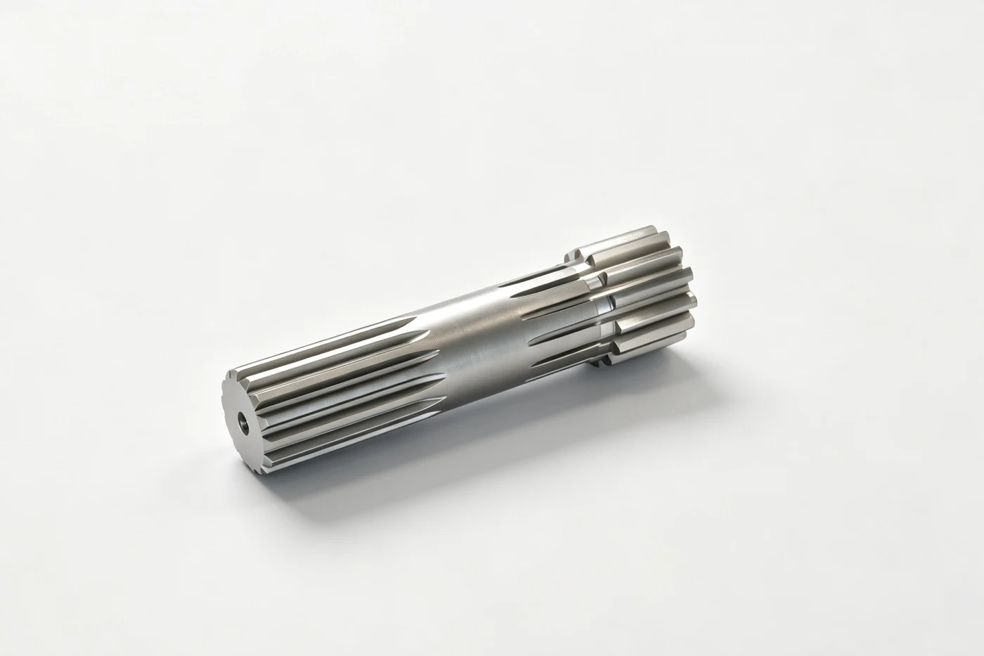 Travel reducer sun-gear shaft